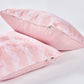 Combinación de funda de almohada y manta de piel sintética de Ballys 